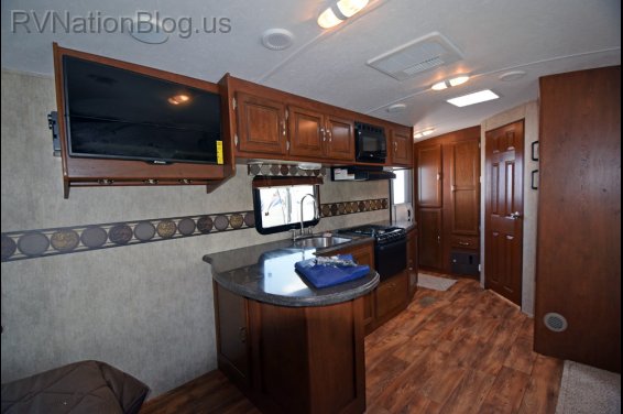 Click here to see the New 2015 Passport Elite 23RB Travel Trailer by Keystone RV at RVNation.us