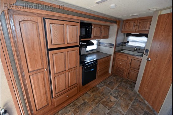 Click here to see the New 2015 Rockwood Ultra Lite 2304DS Travel Trailer by Forest River at RVNation.us