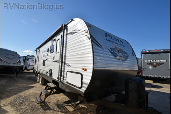 Click here to see the New 2016 Canyon Cat 29FQC Travel Trailer by Palomino at RVNation.us