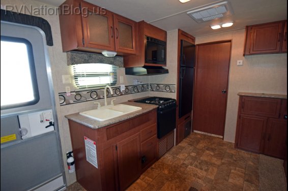 Click here to see the New 2016 Canyon Cat 29FQC Travel Trailer by Palomino at RVNation.us