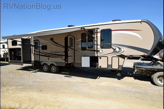 Click here to see the New 2016 Sandpiper 365SAQB Fifth Wheel by Forest River at RVNation.us