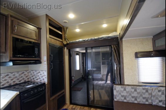 Click here to see the New 2016 Puma 356QLB Toy Hauler Fifth Wheel by Palomino at RVNation.us