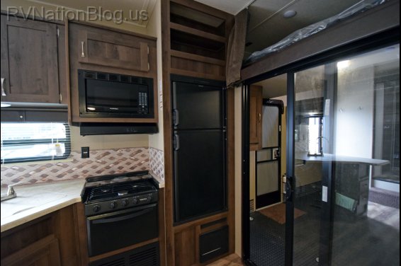 Click here to see the New 2016 Puma 356QLB Toy Hauler Fifth Wheel by Palomino at RVNation.us