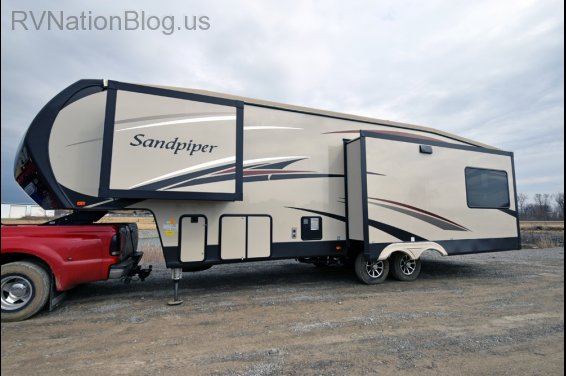 Click here to see the New 2016 Sandpiper 354RET Fifth Wheel by Forest River at RVNation.us