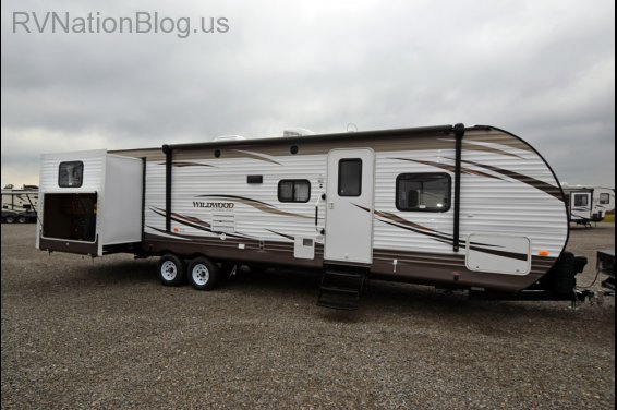 Click here to see the New 2017 Wildwood 31KQBTS Travel Trailer by Forest River at RVNation.us